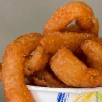 Onion Rings · Fried beer battered onion ring with seasoning.