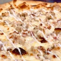 Chicken Bacon Ranch Pizza* · Grilled Chicken, Bacon, and Mozzarella Cheese With Our House Ranch Dressing.