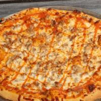 Buffalo Chicken Pizza* · Spicy, Tangy Creation With Grilled Chicken, Celery, Red Onions, and Buffalo Sauce.