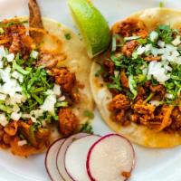 Chorizo (Mexican Sausage) Tacos Trios · With, cilantro, onions and limes.