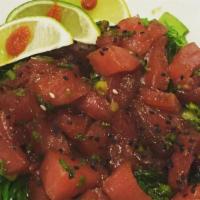 Tuna Poke Bowl · ahi tuna, scallions, mango, avocado, asian slaw, seaweed,  sesame oil, tamari soy marinade, ...
