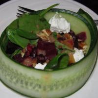 Beet Salad · roasted red and golden beets, spring mix, goat cheese, golden raisins and    candied pecans,...