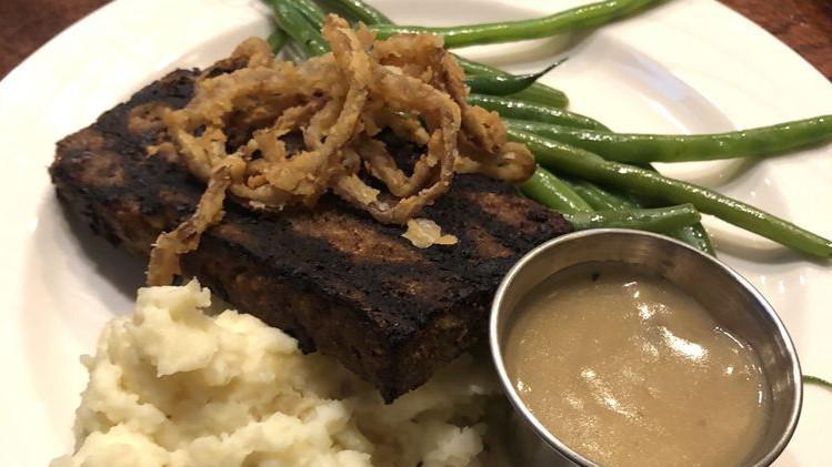 Bbq Meatloaf* · as featured in the boston globe, smokey bbq brisket folded into choice ground sirloin, grilled over open flame, served  over garlic smashed potatoes with homemade mushroom gravy and fresh vegetables