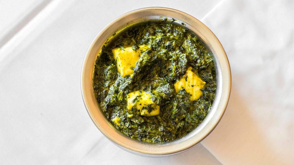 Saag Paneer · Homemade cheese fried and cooked with fresh spinach.