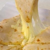 Cheese Naan · Unleavened bread stuffed with cottage cheese baked in clay oven.