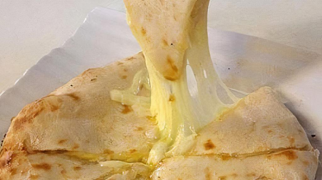 Cheese Naan · Unleavened bread stuffed with cottage cheese baked in clay oven.