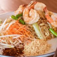 Shrimp Pad Thai · Stir-fried rice noodles with egg, bean sprouts, scallions, and ground peanuts.