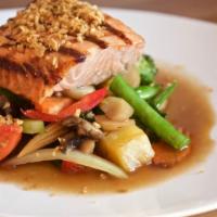Garlic Salmon · Grilled marinated salmon topped with sauteed mixed vegetables. Rice is not included.