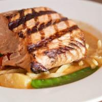 Salmon Choo Chee · Grilled salmon topped with snow peas, bamboo shoots, baby corn, pineapple chunks, red pepper...