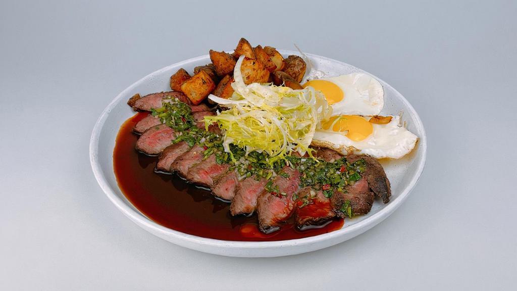 Steak & Eggs · (GS) 8 oz Flatiron steak*, 2 eggs*, garlic home fries, chipotle demi glace, chimichurri, dijon frisée salad