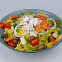 Greek Salad · Pepperoncinis, cucumbers, tomatoes, red onions, kalamata olives, feta cheese, pita chips, or...