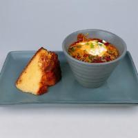 Stovetop Chili Cup · Sour cream, cheddar, chives, buttered cornbread