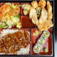 Beef Teriyaki Lunch Bento Box · Served with miso soup, green salad, California roll, vegetable tempura, gyoza and kani shumai.