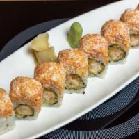 Snow Mountain Maki · Shrimp tempura and snow crabmeat on top. Eight 
pieces of rolled sushi.