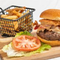 Gables Burger · Ground C.A.B. beef, bacon, crispy onions, lettuce, aged Cheddar, brioche bun, truffle fries....