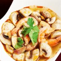 Tom Yum Shrimp Soup · Spicy shrimp lemongrass soup with mushroom, green onion, and cilantro.