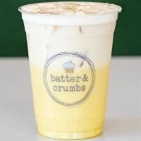 Iced Golden Oat Milk · Golden turmeric with oat milk over ice topped with a dash of black pepper.