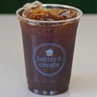 Iced Americano · Two espresso shots topped with cold water. Served over ice.