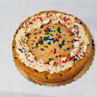 Magic Cookie Cake (9 Inch) · If you like our chocolate chip cookies, you'll love this 9 inch chocolate chip cookie topped...