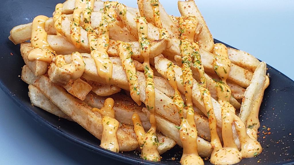 Szechuan Fries · Crispy French fries seasoned with chef's secret spices and served with spicy mayo