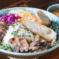 Vermicelli Bowl · Vermicelli rice noodles, shredded lettuce, pickled daikon & carrots, cucumbers, topped with ...