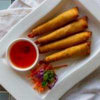 Shrimp Golden · Deep fried shrimp in spring roll sheet served with sweet and sour sauce.