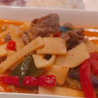 Red Curry · Choice of meat with eggplant, bamboo shoot, bell pepper and basil leaves in red curry.