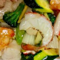 Seafood Combination · Lobster, jumbo shrimp, crab meat, and sea scallops with assorted vegetable in house special ...