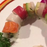 Rainbow Roll · Eight pieces. California inside, top with tuna, salmon, yellowtail, white fish and avocado.