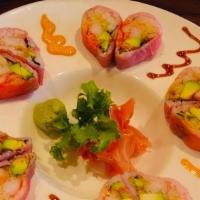 Sweet Heart Roll · Ten pieces. Spicy tuna, shrimp tempura and avocado wrapped with pink soy paper, served with ...