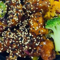 Dinner Sesame Chicken Chinese Combo · Served with choice of rice and side.