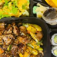 Lunch Hibachi Steak Bento Box · Served with salad, california roll, crab rangoon and rice.