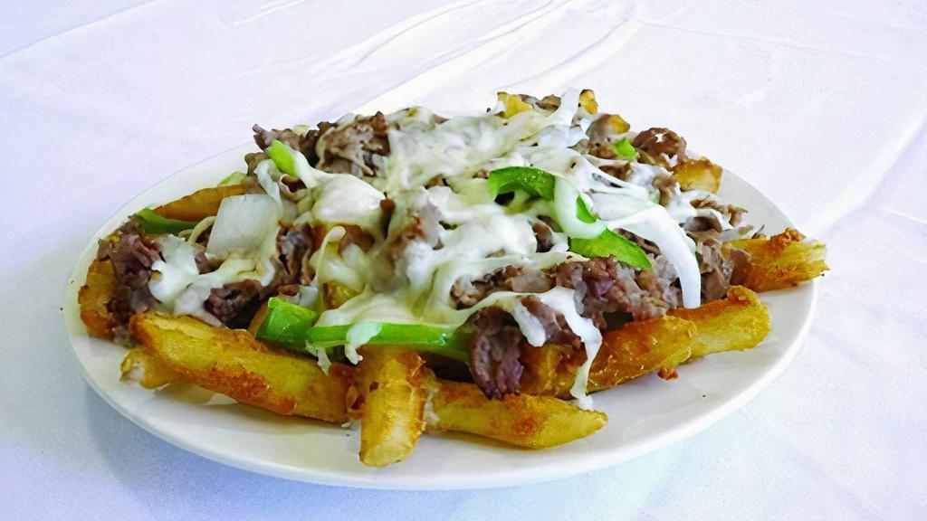 Cheesesteak Fantastic Fries · Crispy french fries topped with steak meat, onions, green peppers and natural cheeses.