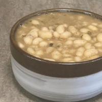 Organic Inti White Beans · slow simmered orangic white beans with sage & epazote