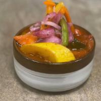 Peperonata Criolla · Slow simmered bell peppers, garlic, tomatoes, onions, jalepeños and seasonal vegetables with...