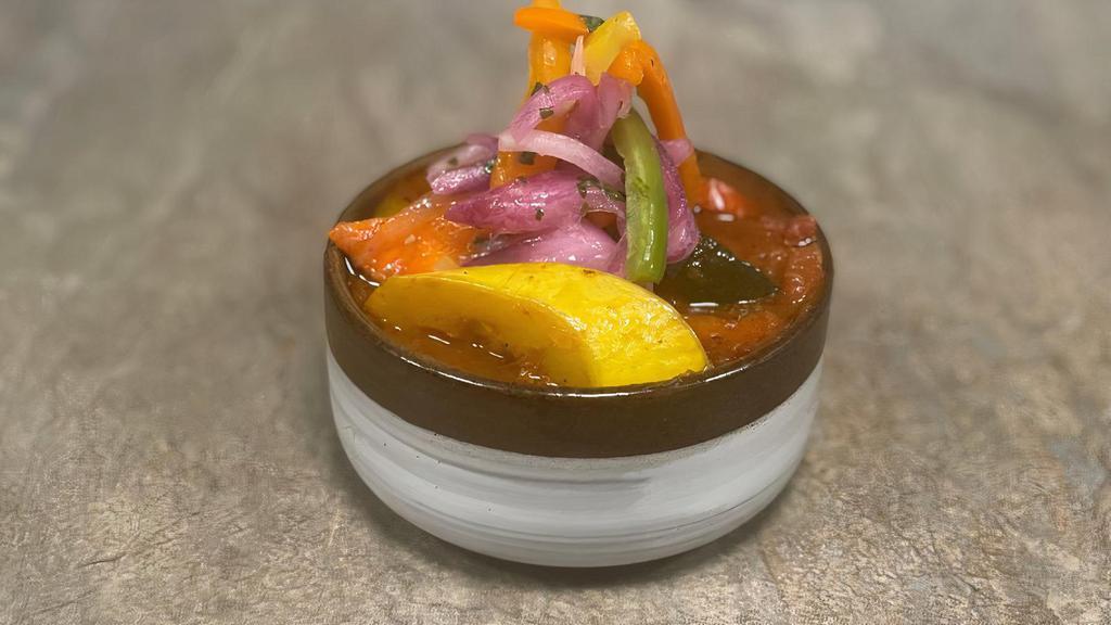 Peperonata Criolla · Slow simmered bell peppers, garlic, tomatoes, onions, jalepeños and seasonal vegetables with sofrito.