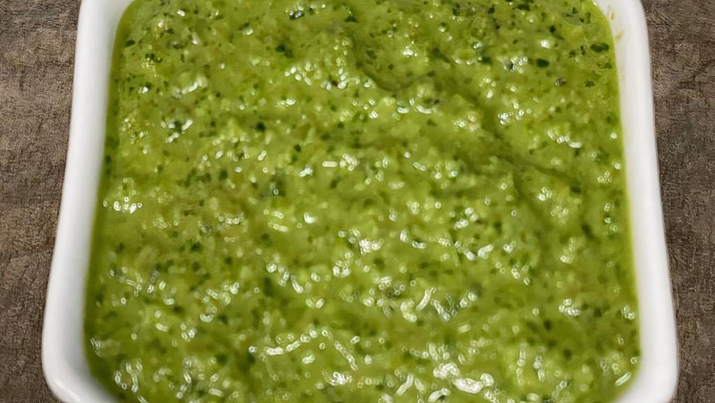 Salsa Verde · This is the ultimate Brasa sauce everyone wants…fresh seeded jalapenos, onions, cilantro, and other spices are blended together to bring that bold Spinz flavor to anything you put it on.