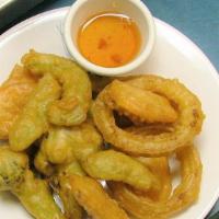 Vegetable Tempura · Assorted vegetable tempura served with sweet and sour sauce.