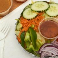 Green Salad · Assorted vegetable with peanut sauce and sweet spicy sauce.