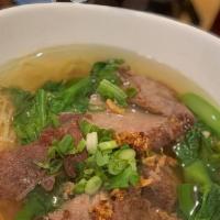 Red Pork Noodle Soup ( New ) · Egg noodle, Chinese broccoli, Thai Red B.B.Q. pork and scallion&cilantro in clear soup.