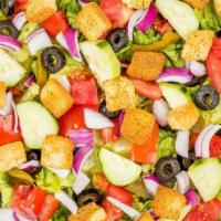 Tossed Salad · Romaine lettuce, tomatoes, cucumbers, red onion, black olives, sweet peppers and croutons