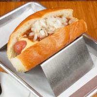 Three Piece Suit Dog · Signature dog topped with homemade beef chili, melted cheese & chopped onion