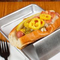Chicago Style Dog · Beef dog topped with tomato, pickle, chopped onion, sweet relish, banana peppers, yellow mus...