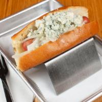 Steakhouse Dog · Signature dog topped with sautéed onions and blue cheese crumbles