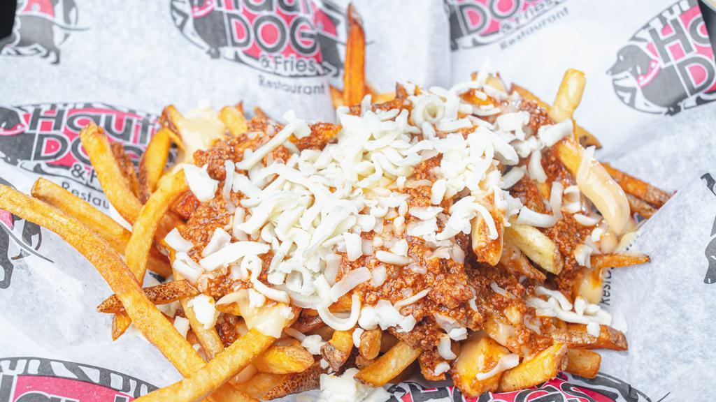 Chili Cheese Fries · Hand-cut fries topped with homemade beef chili, cheese sauce and shredded cheese
