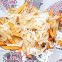 Cheese Fries · Hand-cut fries topped with cheese sauce and shredded cheese