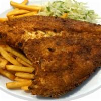 Fried Flounder With French Fries · Delicious fried flounder served with garlic sauce and house salad.
