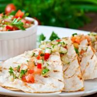 Vegetable Quesadilla · Delicious and juicy grilled veggies and cheese quesadilla.