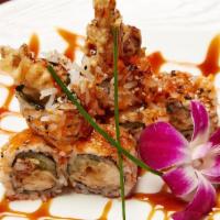 Spider Roll · Fried soft shell crab with cucumber, avocado, tobiko, and eel sauce