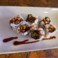 Salmon Skin Roll · Crunchy Salmon skin, cucumber, and scallion dressed with eel sauce